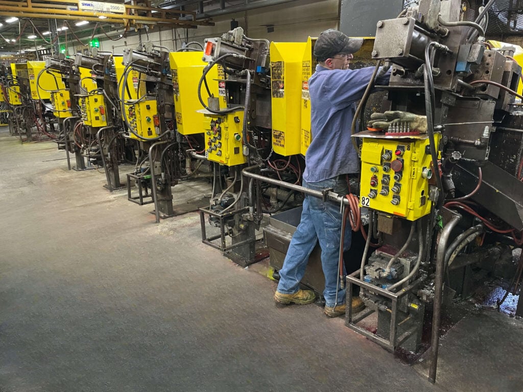 Deco Products Die Cast Machines with Deco Products Team Member