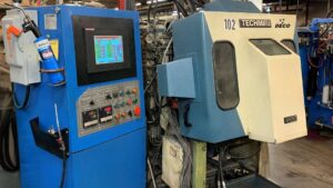 Techmire 44NT Multi-Slide Miniature Die Cast Machine at Deco Products Zinc Die Caster